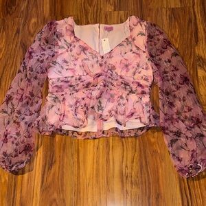 Glamorous Pink Floral Peplum Blouse with Sheer Long Sleeves
